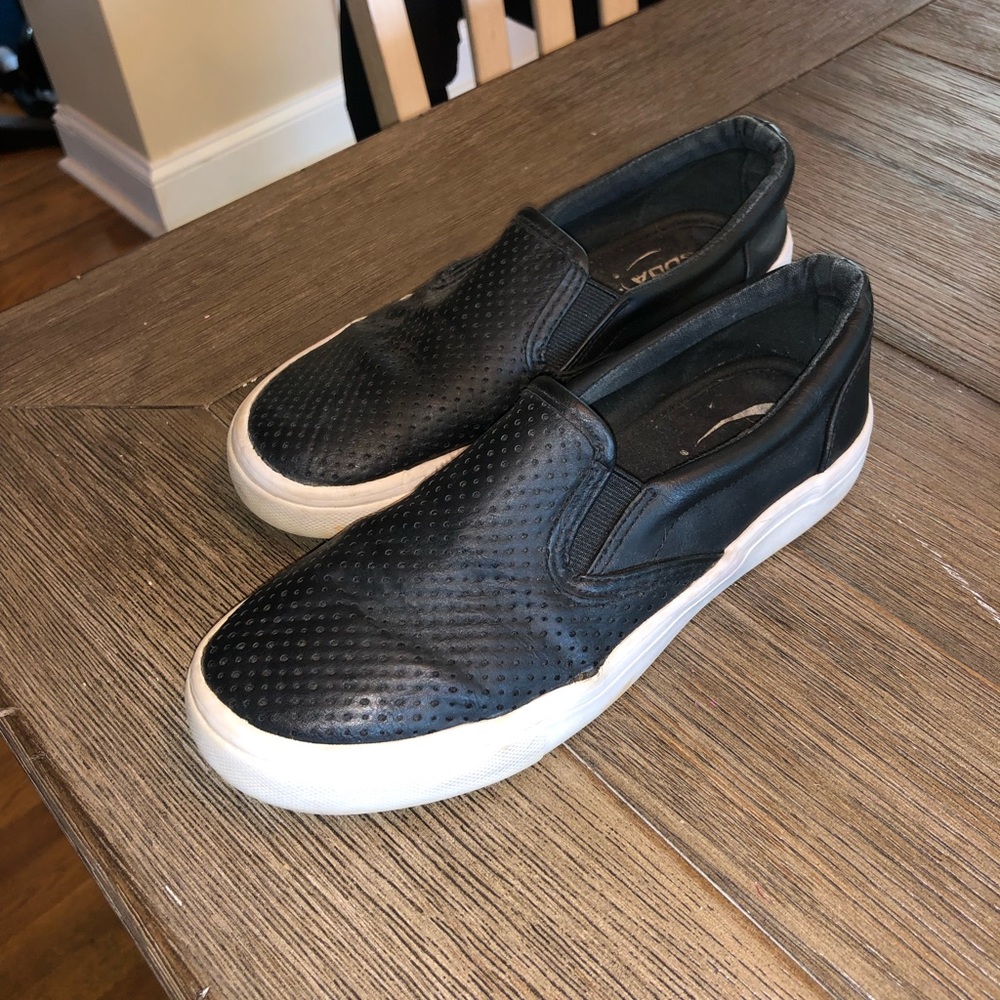 Black soda slip ons!
